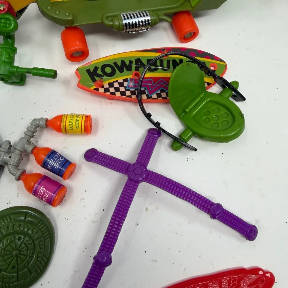 Vintage TMNT Accessories Lot Playmates Sewer Seltzer Skateboard Manhole Covers